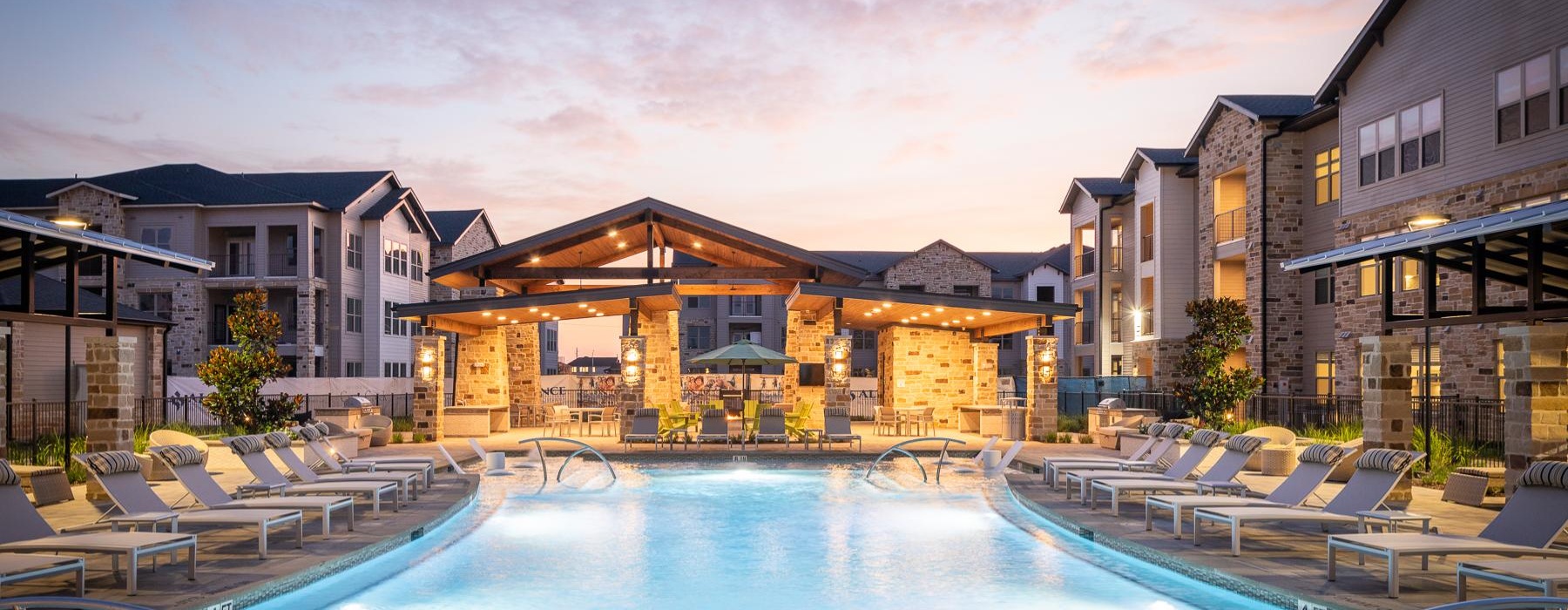 a pool with chairs around it